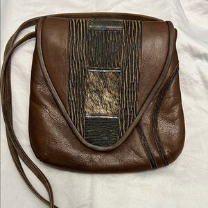 Pat Smiley hand tooled leather and horsehair purse.